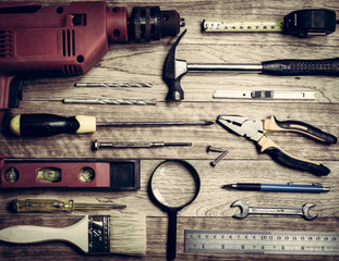 Set of tools over a wood background - 113796283