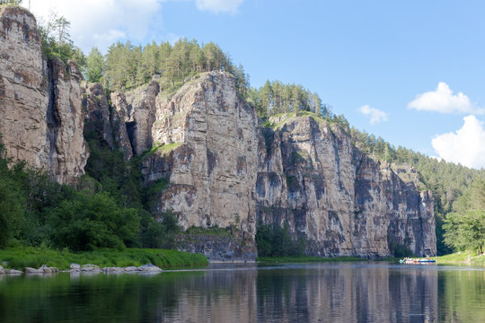Steep cliffs on the Ai river during the rafting, Ural, Russia