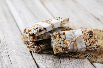 Granola bar on a grey wooden table