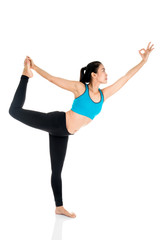 Fototapeta premium Yoga woman - pretty asian female in active wear doing yoga