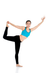 Yoga woman - pretty asian female in active wear doing yoga