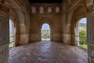 Obraz premium Arches in Islamic (Moorish) style in Alhambra, Granada, Spain - arhitecture