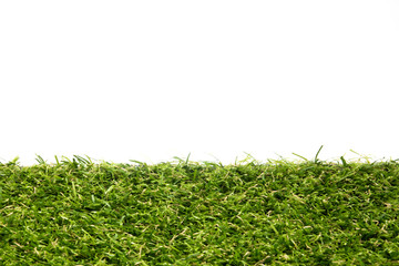 Artificial green grass on white background