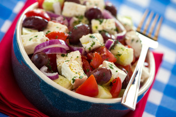 Close up of greek salad with feta cheese tomatoes cucumber olive