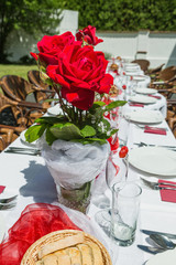 celebration in the garden, Decorated table with candles in the garden