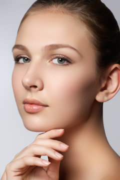 Spa woman. Natural beauty face. Beautiful girl touching her face