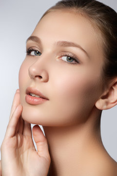 Spa woman. Natural beauty face. Beautiful girl touching her face