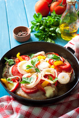 Pork baked with vegetables.