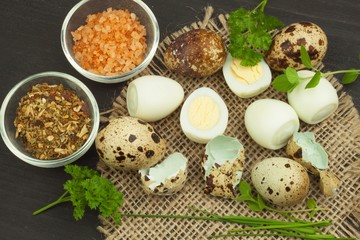 Health & Diet quail eggs on the kitchen table. Some fresh eggs of quail on the table. Quail eggs ready to eat. Advertising on trading with eggs. 

