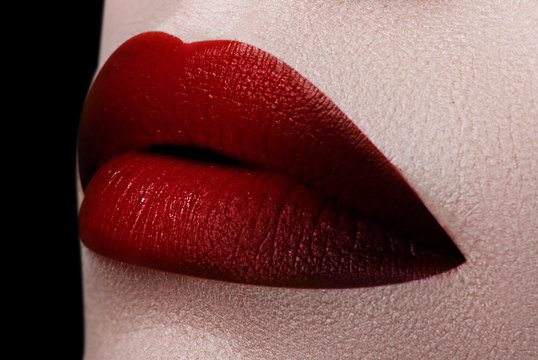 Extreme Close Up On Model With Dark Red Lipstick. Makeup