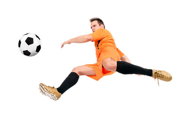 Soccer football player kicking the ball isolated on a white background