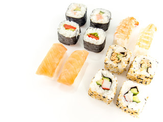 assorted delicious japanese traditional sushi over white