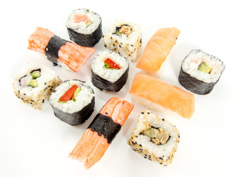 assorted delicious japanese traditional sushi over white