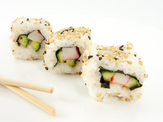 assorted delicious japanese traditional sushi over white