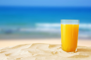 tropical sandy beach, fruit cocktail and seashells