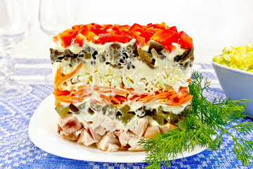Salad with chicken and dill on tablecloth