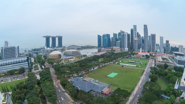 Day to night time lapse at Singapore city skyline at Marina Bay, 4K
