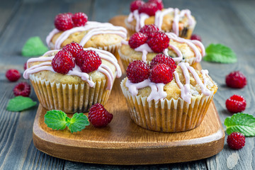 Banana bread muffins with raspberries, cherries and white chocolate, horizontal