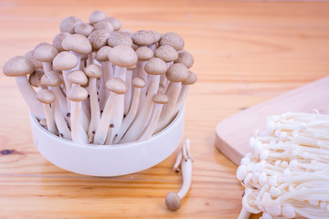 Brown beech mushroom, shimeji mushrooms on wooden background