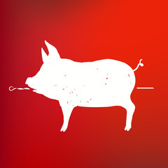 silhouette of a pig on a skewer