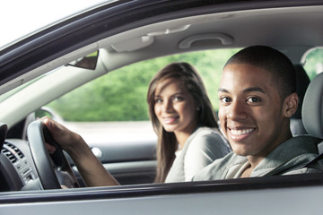 Teenagers driving car