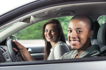 Teenagers driving car