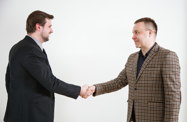 Businessmen shake hands