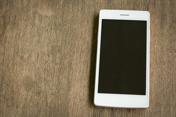 Mobile white on a wooden floor.