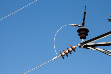 Strain insulator and jumper wire on a  power line