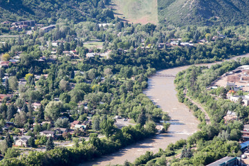 Fototapeta na wymiar Animas River through Durango, CO - brown with spring runoff