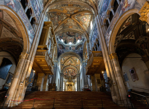 12th-century Romanesque Parma cathedral filled with Renaissance art. Its ceiling fresco by Correggio is considered a masterpiece of Renaissance fresco work.