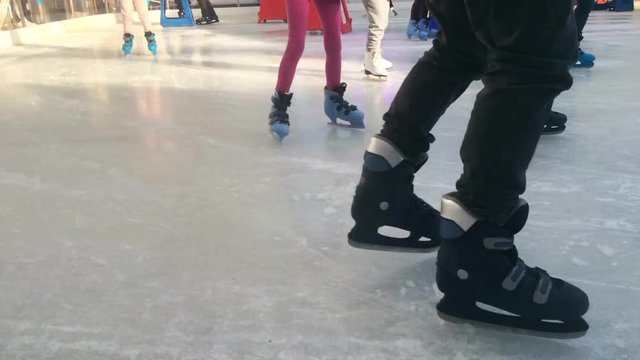 Time lapse of people leges Ice skating