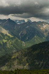 Obraz premium dramatic clouds over high Tatra mountains peaks