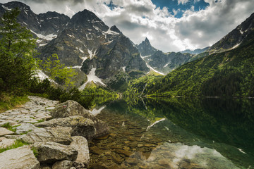 Fototapeta na wymiar High mountains reflect in Morskie Oko Lake