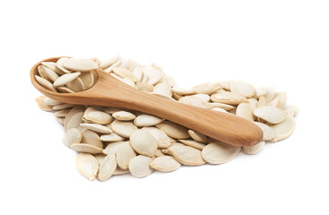 Heart shape made of pumpkin seeds isolated