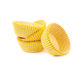 Yellow paper cupcake cup isolated