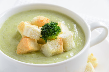 Fresh broccoli cream soup in bowl