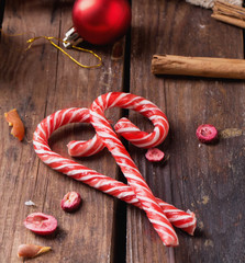 Christmas candies on rustic wooden board