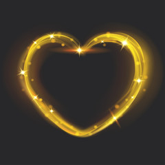 Abstract light effects in the shape of a heart in gold colors