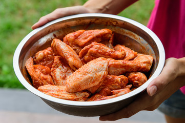 Raw spiced Chicken Wings before cokking