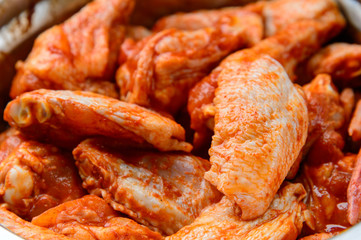 Raw spiced Chicken Wings before cokking