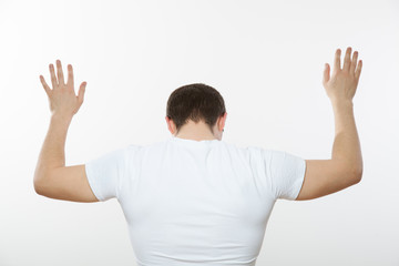 Young man turning back and capitulating
