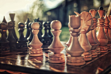 textured retro effect photo of chess on board concept