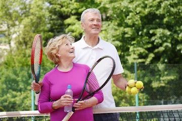 Foto op Canvas Seniors playing tennis © sepy