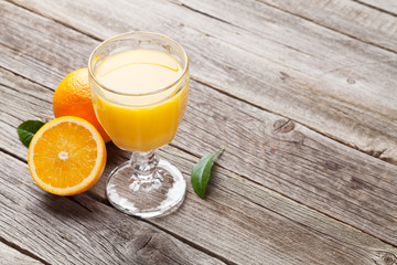 Fresh ripe oranges and juice