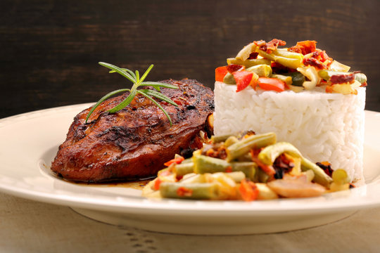 Grilled chicken with rice and vegetables