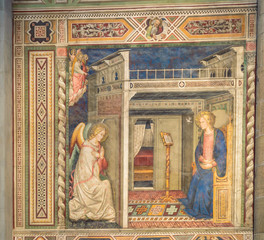 Old rainassance fresco painting of the Annunciation of the Archangel Gabriel to the Virgin Mary, on the wall of the cathedral of Santa Maria del Fiore in Florence.