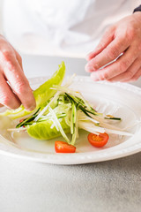 chef making salad
