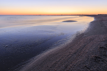 Coast beach in the Caspian Sea near Baku at sunrise.Azerbaijan