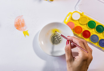 Woman hands painting